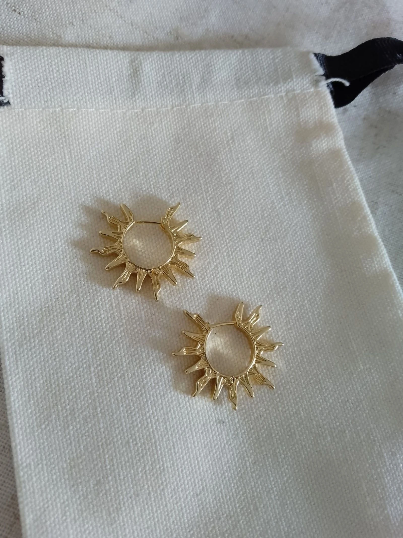 Créoles soleil acier doré 